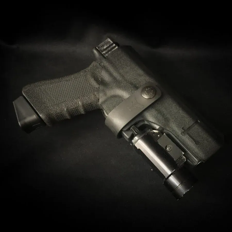 www.trb-holsters.com_wp-content_uploads_2024_09_holster-kydex-lampe-universel-owb_03.webp